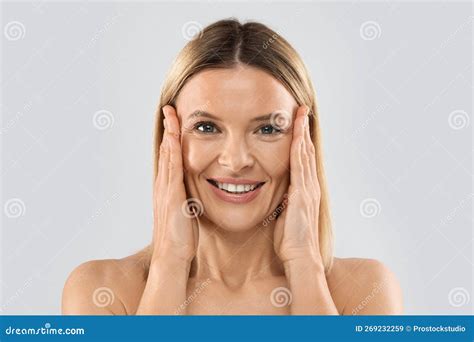 Pretty Nude Middle Aged Blonde Woman Touching Face Closeup Stock Image Image Of Halfnaked