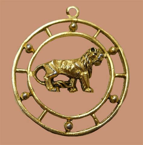 Leo zodiac sign zodiac pendant. Made of jewelry alloy of gold tone ...