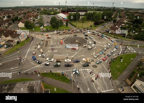 Collection Of 60 Classic Cars Parade Around The Magic Roundabout