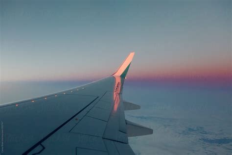 "View Of Horizon From Plane Window" by Stocksy Contributor "Carey Shaw" - Stocksy