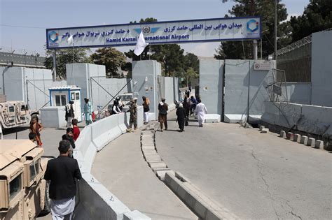 Kabul airport reopens to receive aid, domestic flights restart | Reuters