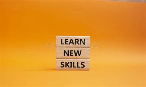 Learn New Skills Symbol Concept Words Learn New Skills On Wooden Blocks Beautiful Orange