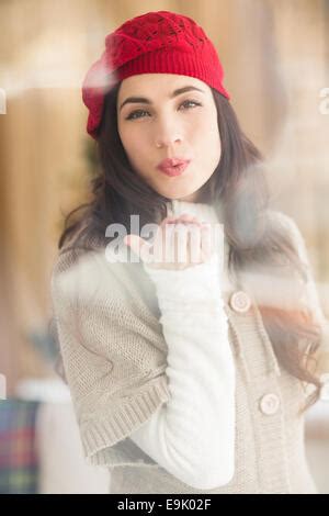 Pretty Brunette Blowing A Kiss Stock Photo Alamy