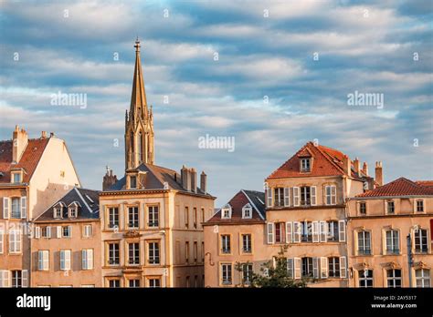 A Row Of Houses In Metz Against The Backdrop Of The Temple De Garnison