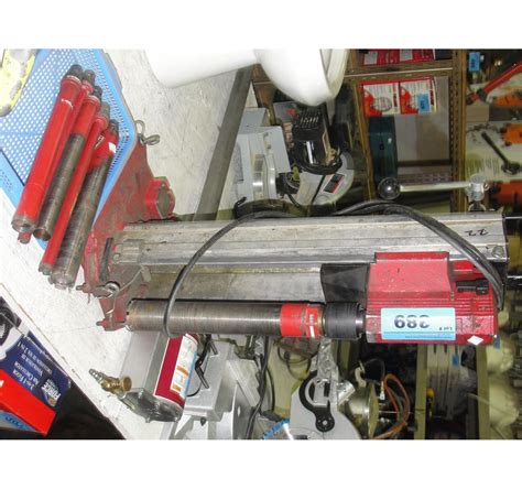 Hilti concrete drill with 5 additional attachments