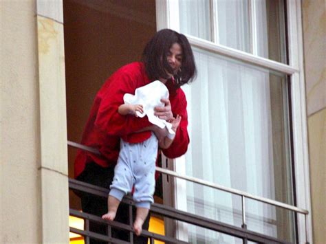 Mother dangles baby out of window by wrists in ‘Michael Jackson’ moment after King of Pop's song ...