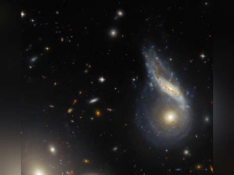 Hubble Space Telescope captures spectacular collision of two galaxies | The Peninsula Qatar