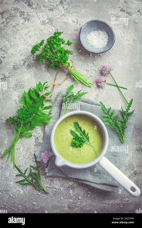 Healthy Homemade Green Herb Soup In Pot Made From Local Wild And Garden