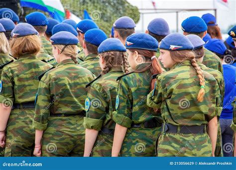 A Group of Teenage Girls in Military Uniform in Blue Berets Editorial ...