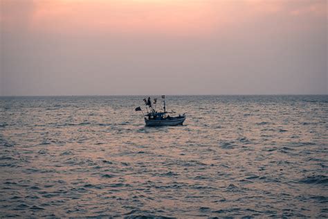 Free Images Sea Coast Ocean Horizon Sunrise Sunset Boat Shore