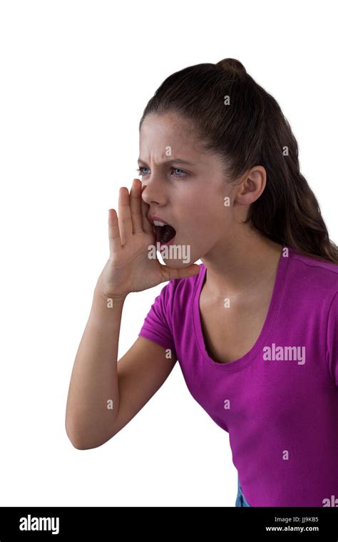 Angry Girl Screaming Against A White Background Stock Photo Alamy