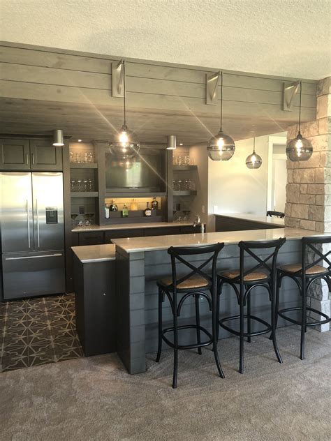 Rustic Basement Bar With Three Bar Stools
