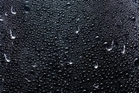 Water Droplets On Black Background Stock Photo At Vecteezy