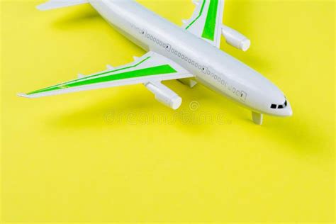 Miniature Toy Airplane On Yellow Background. Trip By Airplane Stock Photo - Image of model ...