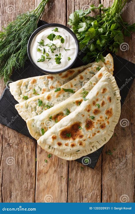 Azerbaijani Food: Flatbread Qutab with Greens and Yogurt Close-u Stock ...