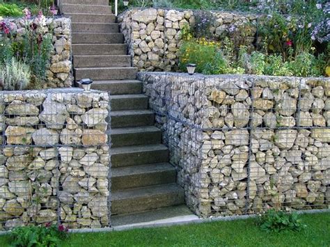 50 Smart Ways To Use Gabions In Your Garden Sloped Garden Gabion Retaining Wall Garden Steps