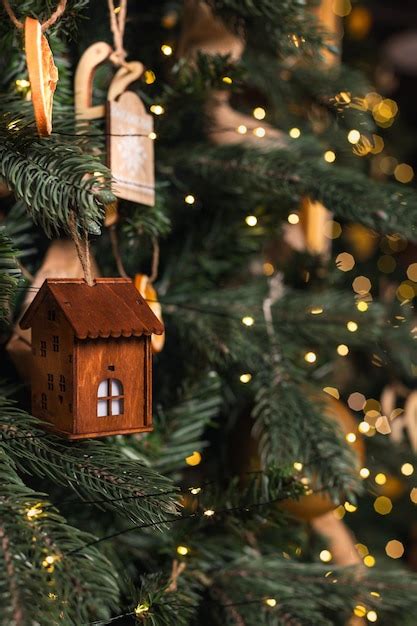 Premium Photo | Decorations on the christmas tree closeup vintage house ...