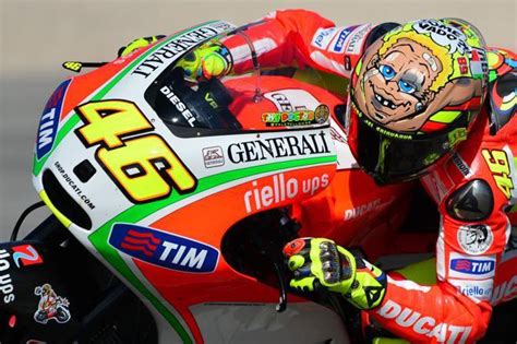 Valentino Rossi with his special design helmet during very difficult ...