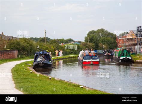 Canal Narrowboat Passing Through Stone Stafordshire On The Trent And