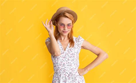 Premium Photo Smiling Woman In Straw Hat And Sunglasses On Yellow