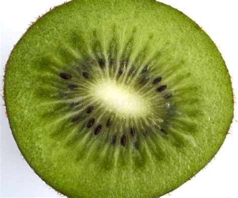 Green Kiwi Fruit Cut In Half Next To Whole One Isolated On White