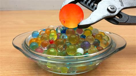 Experiment Glowing Degree Metal Ball Vs Orbeez Satisfying Youtube