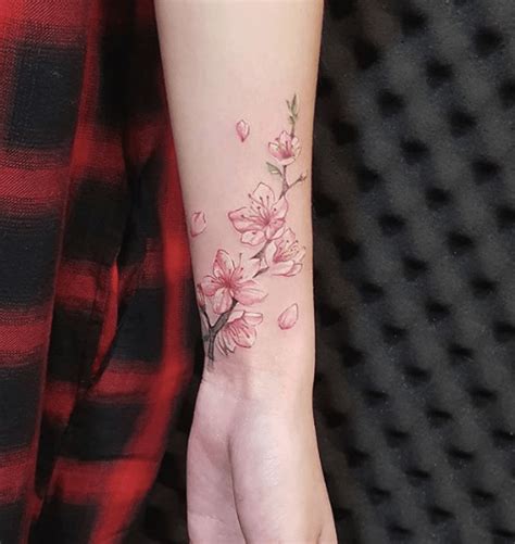 Cherry Blossom Tattoo Designs And Ideas To Try In 2020 Tattoo Stylist