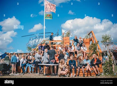 Dream City Roskilde Festival With Excited People Drinking And