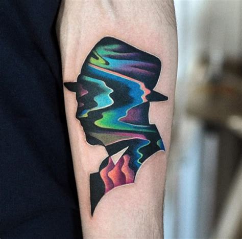 10 Surrealism Tattoo Designs That Will Blow Your Mind