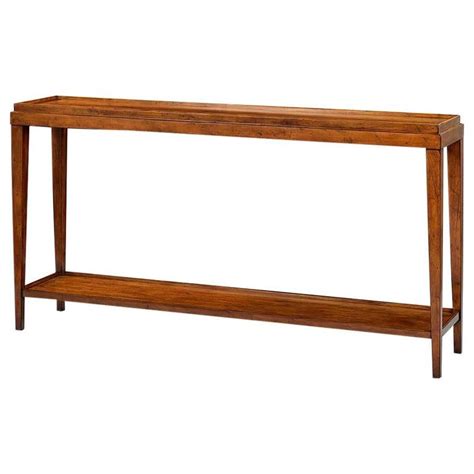 A Classic rustic console table with a warm walnut stain finish with ...