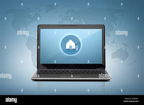 laptop computer with house button on screen Stock Photo - Alamy