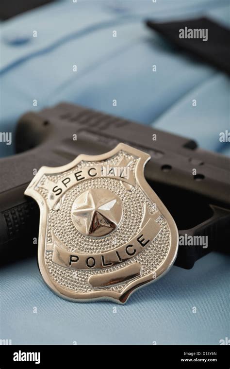 Police Officer Badge And Gun
