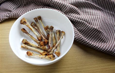 Can Dogs Eat Raw Chicken Bones - Is It Safe For My Dog To Eat It?