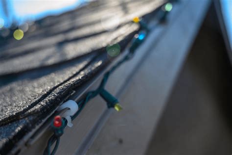 How To Hang Christmas Lights On A Shingle Roof Weather Vane Roofing