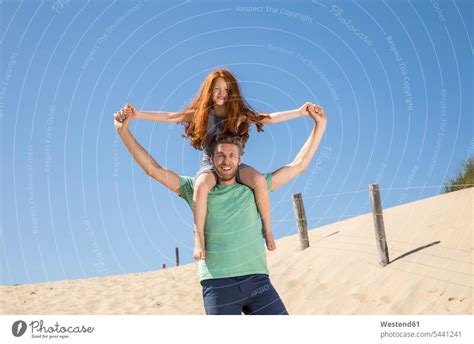 Netherlands Zandvoort Happy Father Carrying Daughter On Shoulders On