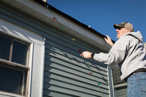 Hanging Christmas Lights On Your Roof Coastal Roofing