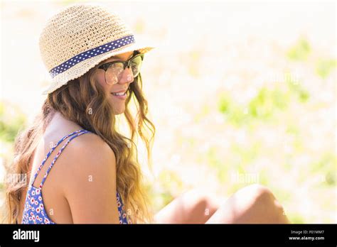 Pretty Brunette Relaxing In The Grass Stock Photo Alamy