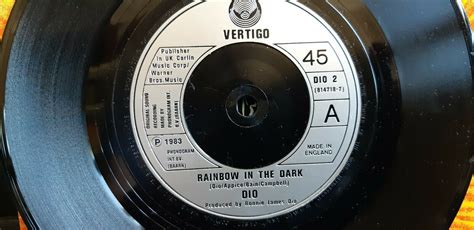 popsike.com - Dio Signed Rainbow in the Dark 7" single Ronnie James Dio ...