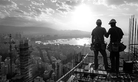 Professional Construction Crew Working On A Large Building Project