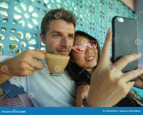 Mixed Ethnicity Couple In Love Smiling Cheerful With Handsome Caucasian