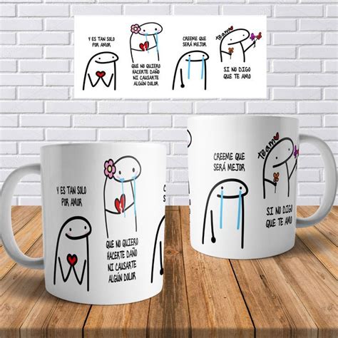 Two White Coffee Mugs With Cartoon Drawings On Them One Is Holding A Heart