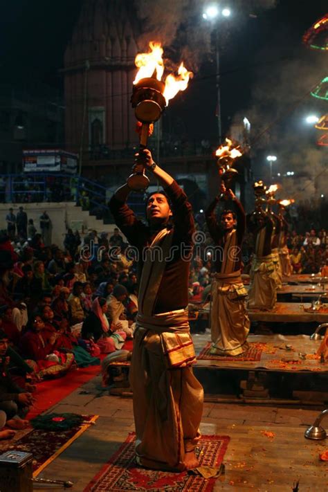 Professional Hindu priests worship at Varanasi, India. Group of ...