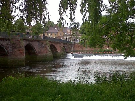 The Weir River Dee And Old Dee Bridge In Chester Uk