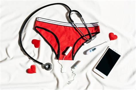 Premium Photo Women S Underwear Stethoscope Smartphone And Thermometer Concept Of Women S