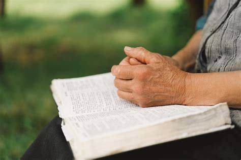 Premium Photo | Bible reading book or old woman praying for hope help ...