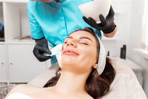 Facial Beauty Procedure Beautician In Latex Gloves Applying With