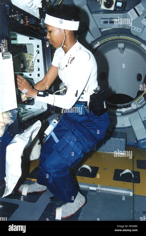 Astronaut Mae Jemison working on experiment during STS-47 mission Stock Photo - Alamy