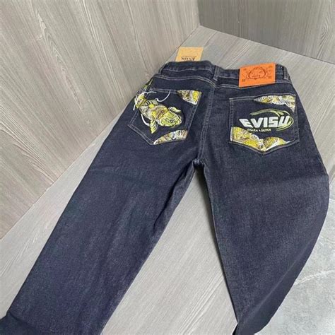 Джинсы Evisu - купить с доставкой по выгодным ценам в интернет-магазине ...