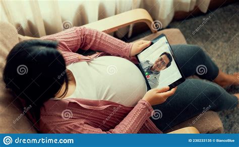 Doctor Telemedicine Service Online Video With Pregnant Woman For