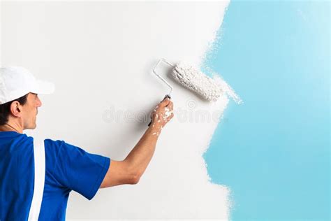 Painter Painting A Wall With Paint Roller Stock Photo Image Of Paint